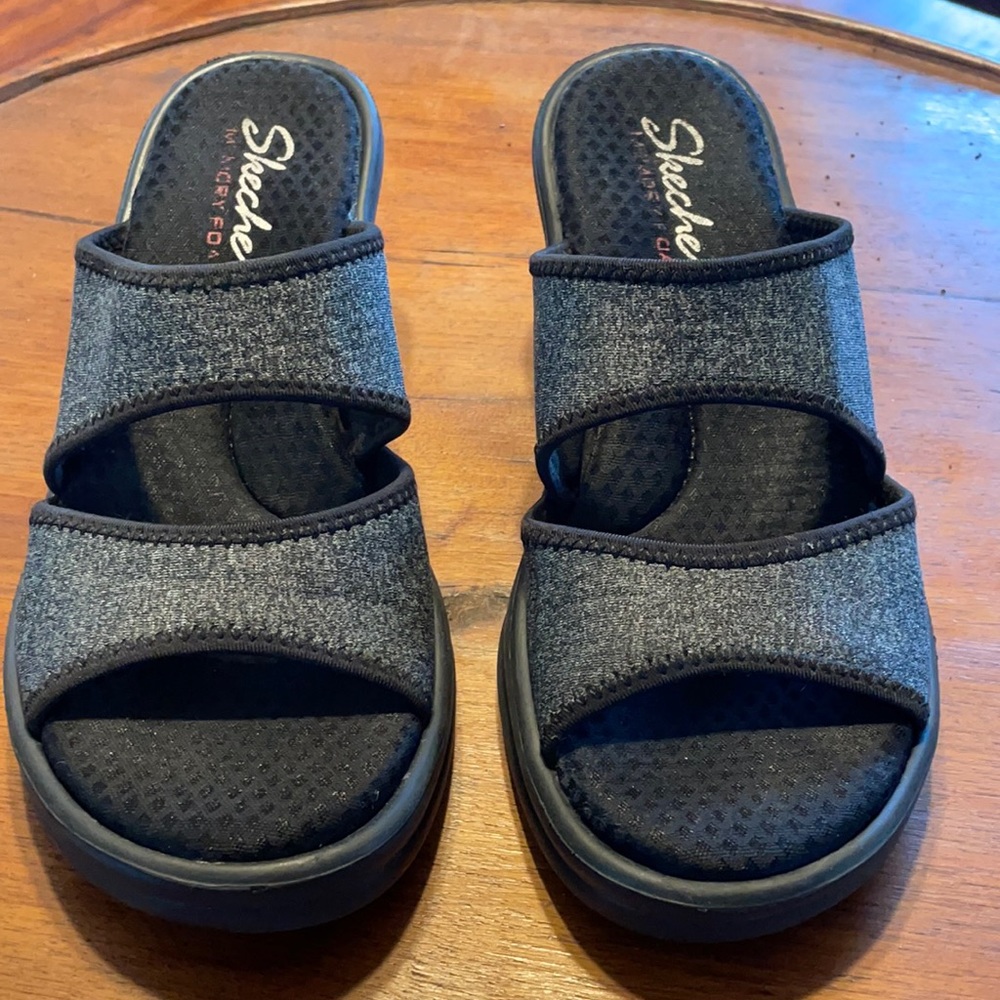 Skechers wedge sandals slides. They have 2 1/8 inch heel.